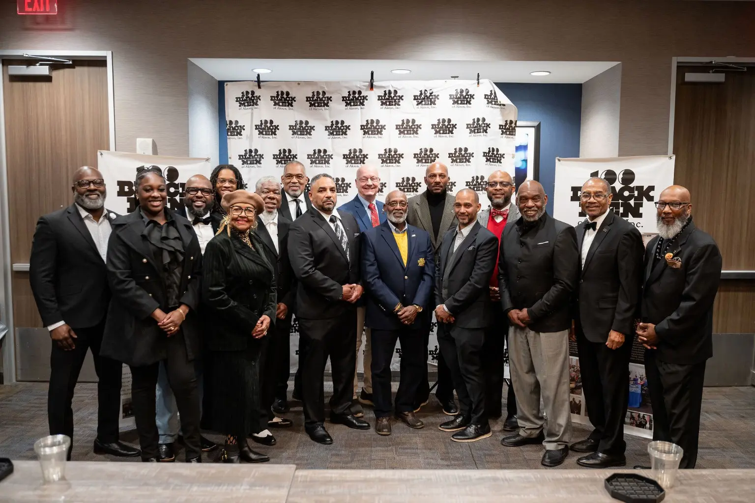 100 Black Men of Akron members and community partners gathered together