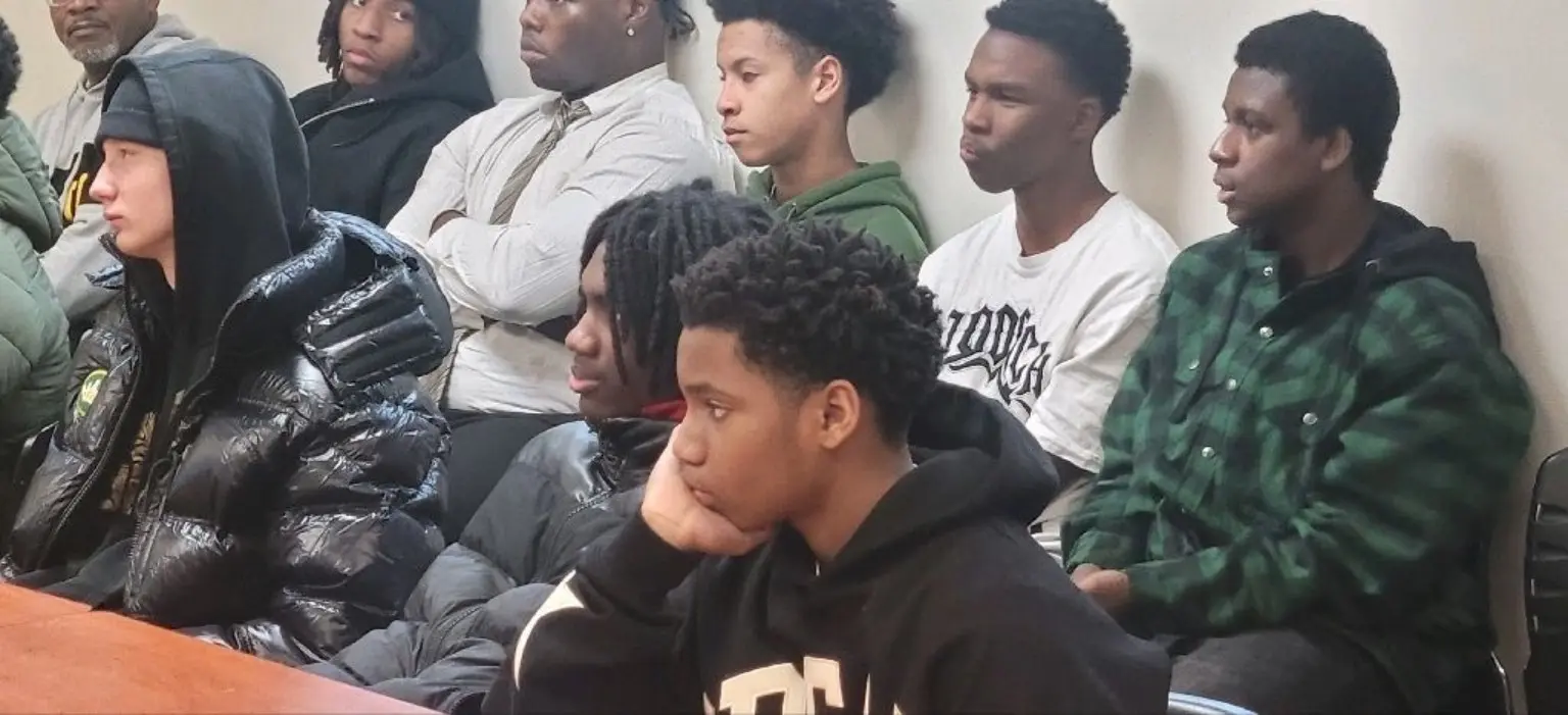 Young people listening during a 100 Black Men of Akron Leadership Academy session